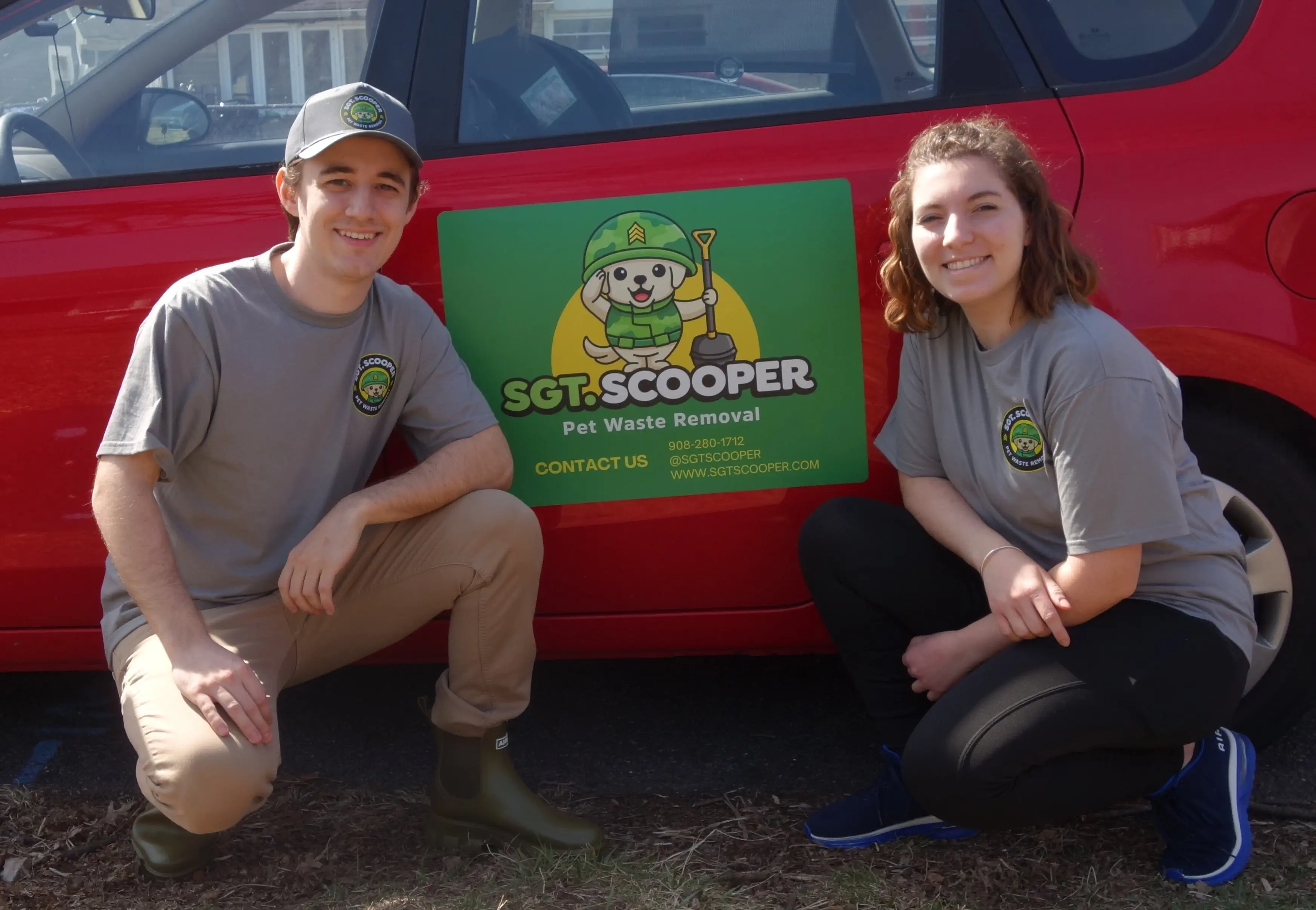 Dom and Pam Dicosimo by the Sgt. Scooper vehicle